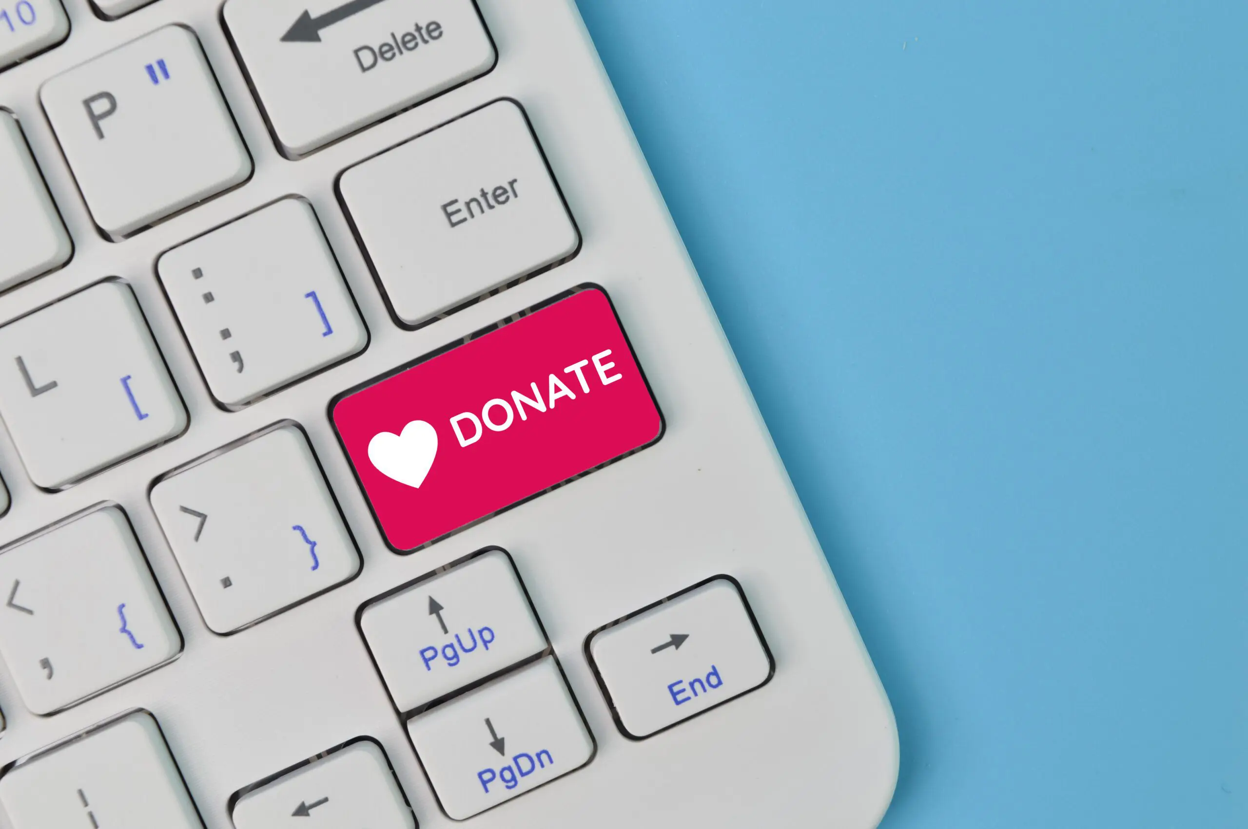 keyboard with "donate button" in pink