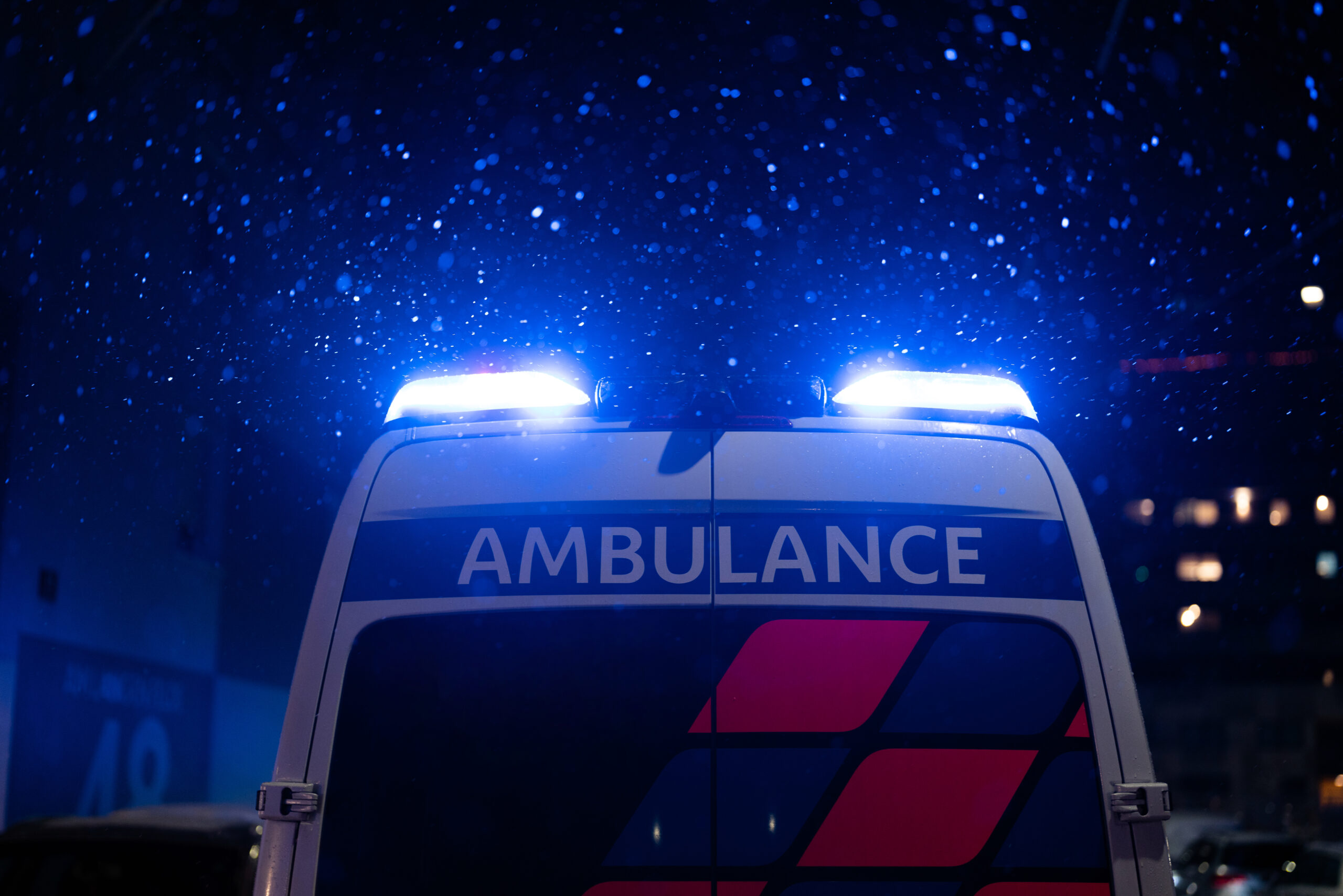 ambulance with lights on at night