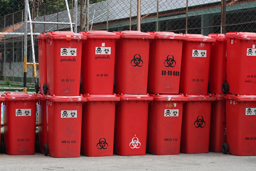 medical waste bins lined up outside
