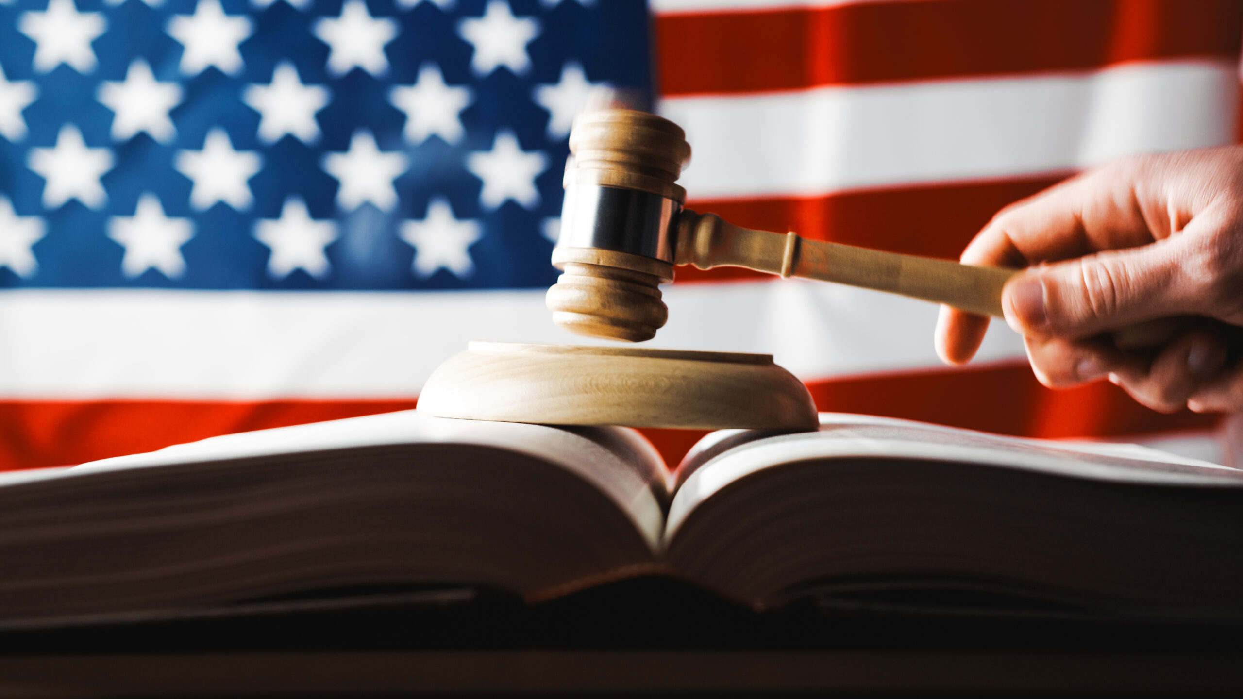 US flag, gavel and law book