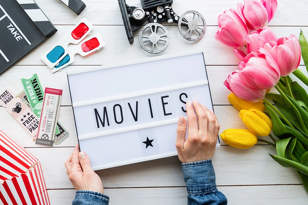sign with the word movies on it.